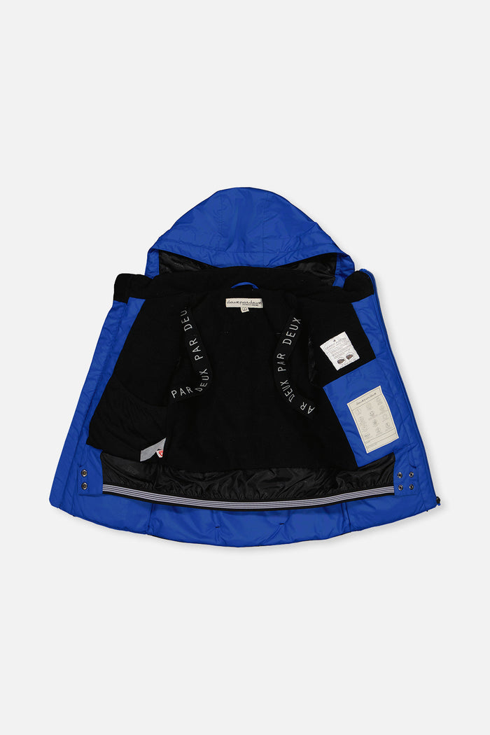 Royal blue TEKNIK jacket opened to show the black fleece lining and inner straps