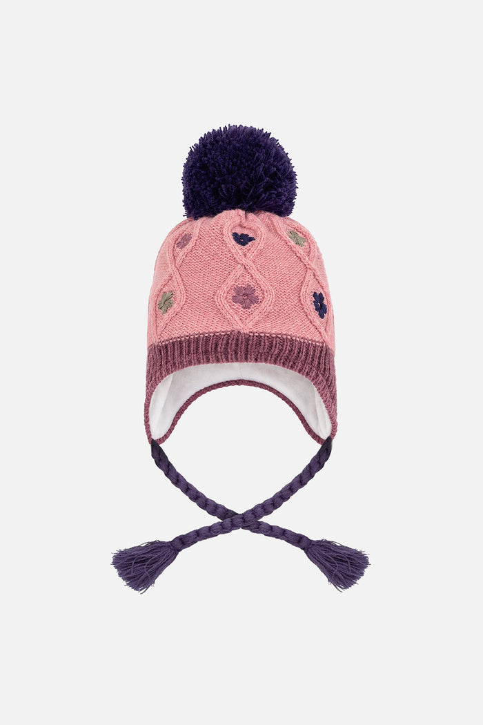 Front view of the pink and mauve pompom knit hat with earflaps