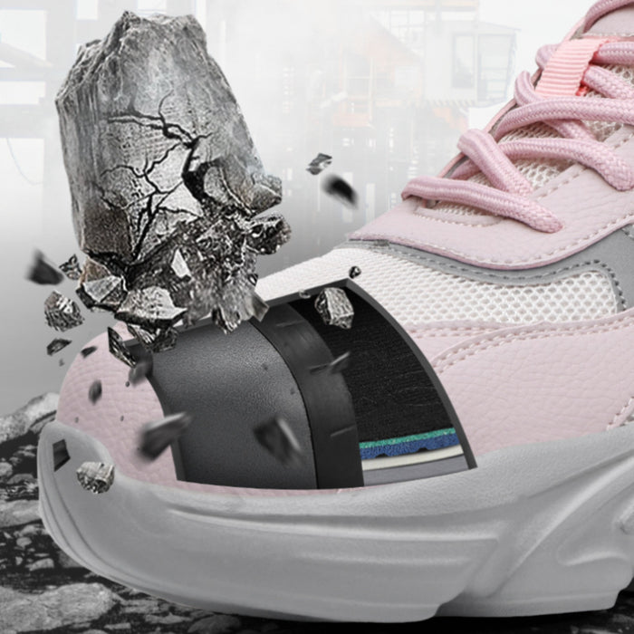 Internal structure view of SafeStep women's pink safety sneakers, showcasing the widened steel toe cap that protects against heavy falling objects.