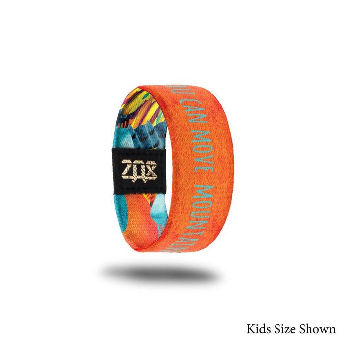 inside design for You Can Move Mountains kid size. Orange background with You Can Move Mountains in blue text at the center