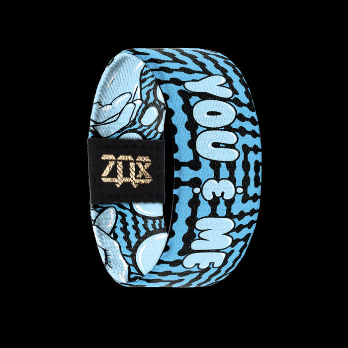 Inside design for You and Me. Blue background with black zig-zag lines. Centered is You & Me in light blue text