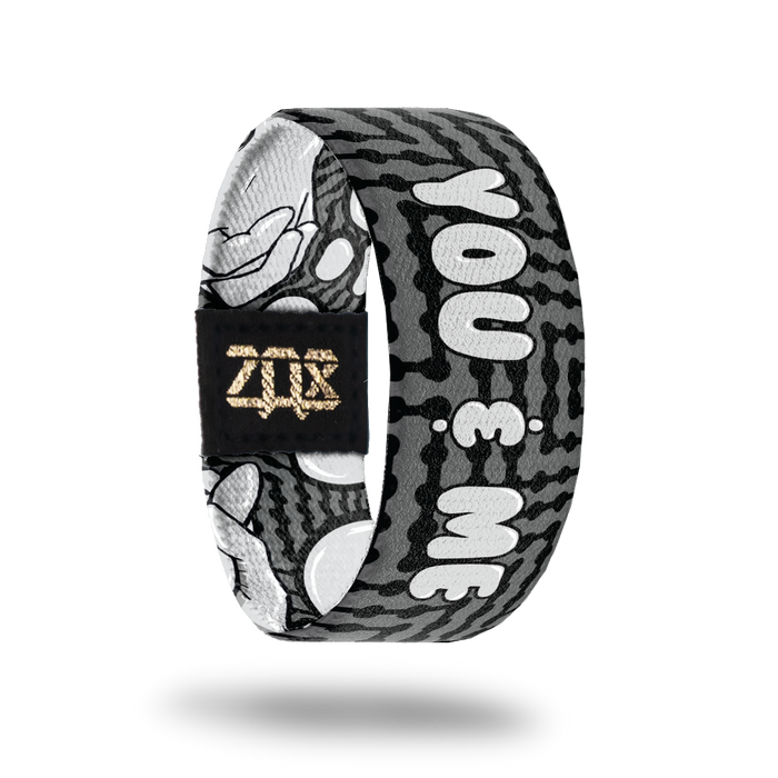 Inside design for You and Me. Dark grey background with black zig-zag lines. Centered is You & Me in light grey text