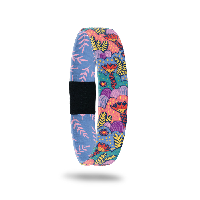 Product photo of the outside of You're Going To Be Okay. It is colorful botanical pattern on it, it is coral, purple, and turquoise with red and yellow accents.