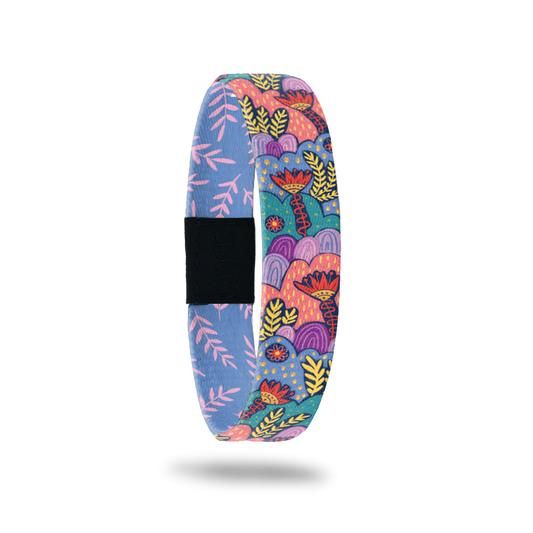Product photo of the outside of You're Going To Be Okay. It is colorful botanical pattern on it, it is coral, purple, and turquoise with red and yellow accents.